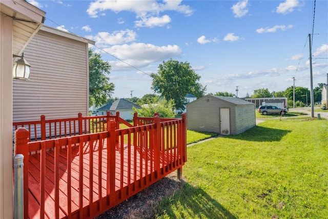 316 E Washington St, Center Point, IA 52213 - view of grassy yard featuring a storage shed and a wooden deck