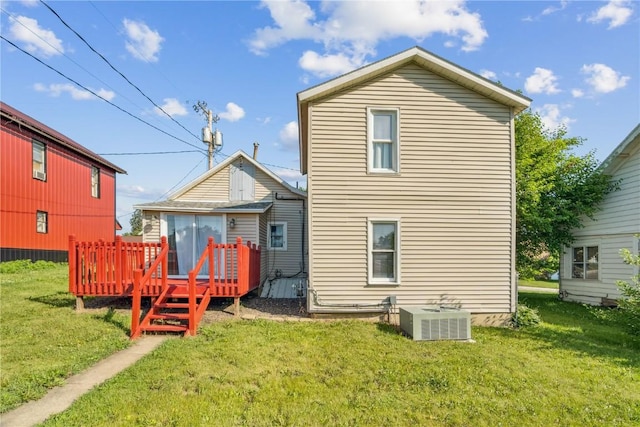 316 E Washington St, Center Point, IA 52213 - back of house with a wooden deck and a yard