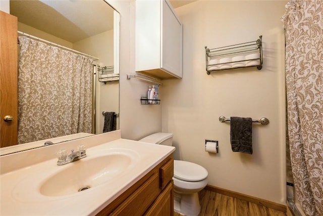 4593 Spoonbill Ct, Marion, IA 52302 - full bathroom with wood finished floors, vanity, and a shower with curtain