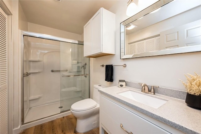 4593 Spoonbill Ct, Marion, IA 52302 - full bathroom featuring a shower stall, vanity, and a closet