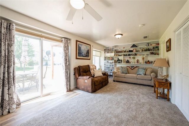 4593 Spoonbill Ct, Marion, IA 52302 - carpeted living room with ceiling fan