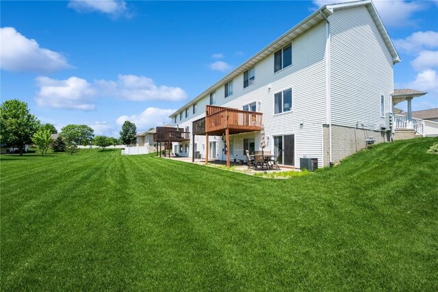 4593 Spoonbill Ct, Marion, IA 52302 - back of house with a yard, a patio area, and a wooden deck