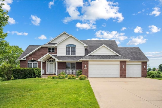 5515 W Mustang Rd NE, Cedar Rapids, IA 52411 - traditional-style house featuring a garage, brick siding, concrete driveway, a front yard, and roof with shingles