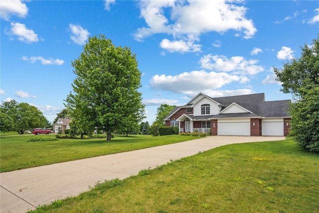 5515 W Mustang Rd NE, Cedar Rapids, IA 52411 - view of front of home with a garage, concrete driveway, a front lawn, and brick siding