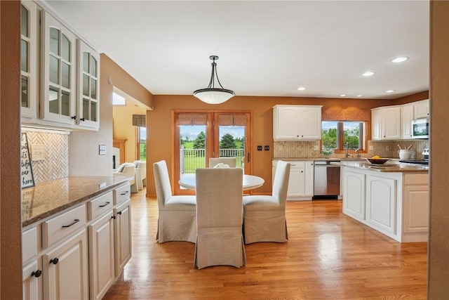 5515 W Mustang Rd NE, Cedar Rapids, IA 52411 - dining room with light wood-style floors and recessed lighting