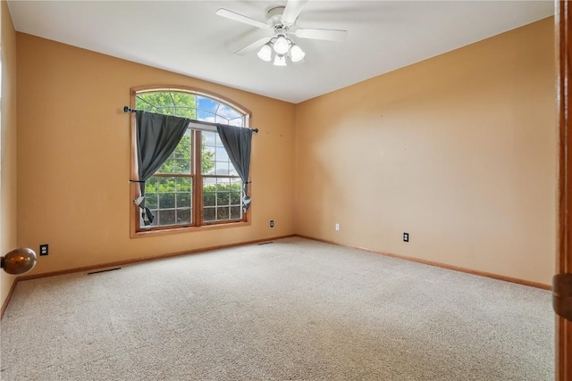 5515 W Mustang Rd NE, Cedar Rapids, IA 52411 - carpeted empty room featuring baseboards and ceiling fan