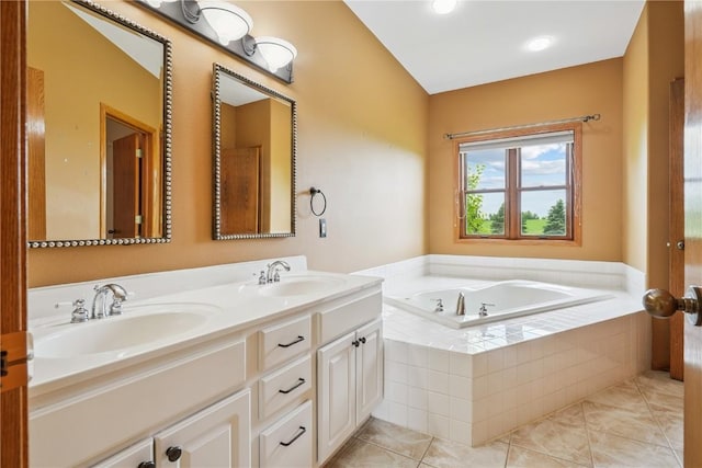 5515 W Mustang Rd NE, Cedar Rapids, IA 52411 - bathroom featuring double vanity and a bath