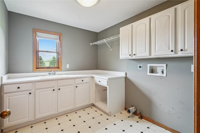 5515 W Mustang Rd NE, Cedar Rapids, IA 52411 - laundry area with electric dryer hookup, cabinet space, hookup for a washing machine, and light flooring