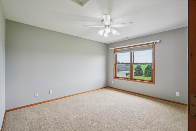 5515 W Mustang Rd NE, Cedar Rapids, IA 52411 - empty room with carpet and a ceiling fan
