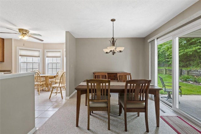 3921 Lexington Dr NE Unit B, Cedar Rapids, IA 52402 - dining room with plenty of natural light, a chandelier, light tile patterned floors, and ceiling fan