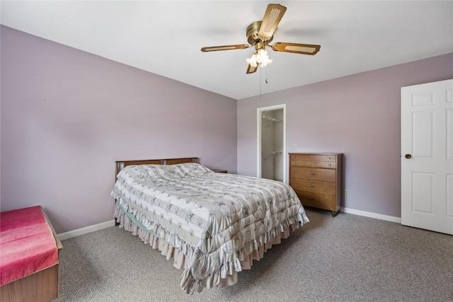 3921 Lexington Dr NE Unit B, Cedar Rapids, IA 52402 - carpeted bedroom with a walk in closet, ceiling fan, and a closet