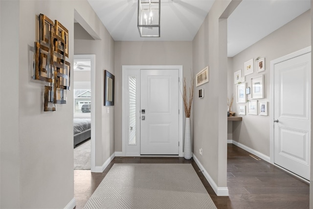 1953 Bowstring Dr, Marion, IA 52302 - entryway featuring dark wood-type flooring and baseboards