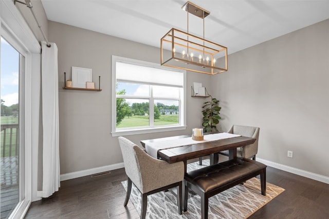 1953 Bowstring Dr, Marion, IA 52302 - dining room featuring dark wood-style flooring and a chandelier