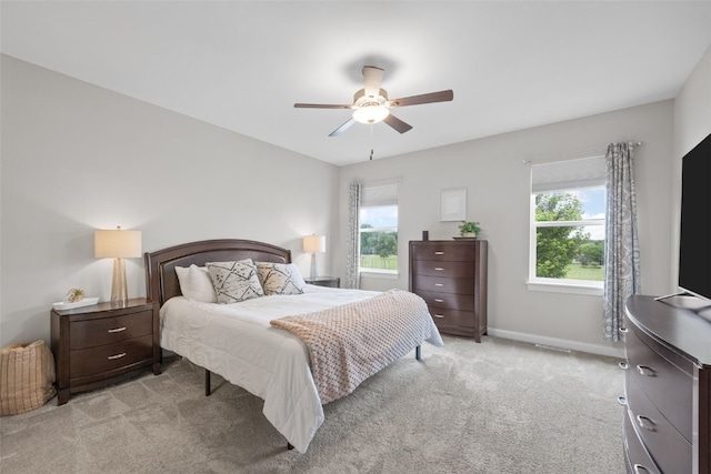 1953 Bowstring Dr, Marion, IA 52302 - bedroom featuring light colored carpet and a ceiling fan