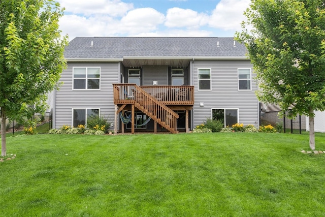 1953 Bowstring Dr, Marion, IA 52302 - back of house featuring a lawn, stairs, roof with shingles, and a wooden deck
