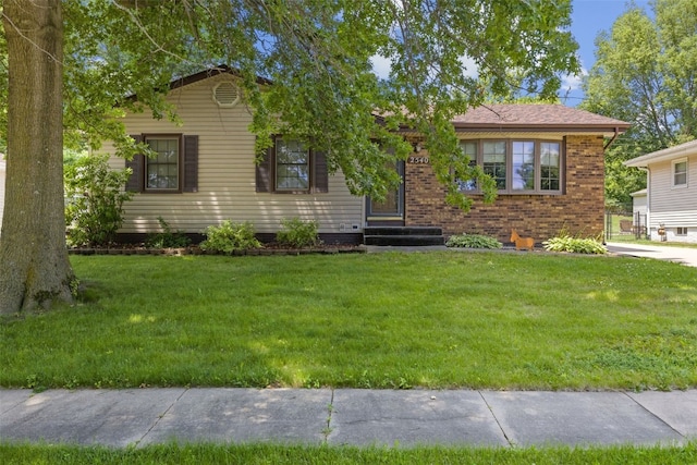 2540 Lori Dr SW, Cedar Rapids, IA 52404 - single story home with a front lawn and brick siding