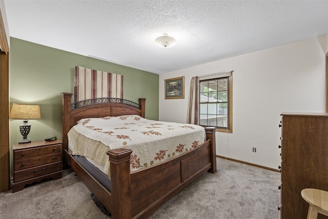 2540 Lori Dr SW, Cedar Rapids, IA 52404 - bedroom featuring carpet flooring and a textured ceiling