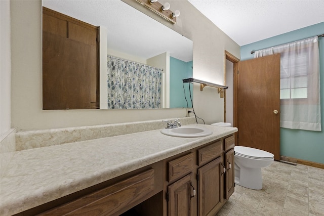 2540 Lori Dr SW, Cedar Rapids, IA 52404 - full bathroom featuring vanity and toilet
