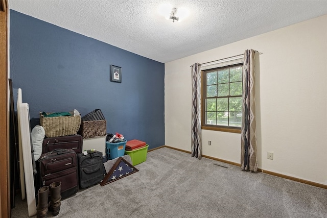 2540 Lori Dr SW, Cedar Rapids, IA 52404 - bedroom with a textured ceiling and carpet flooring