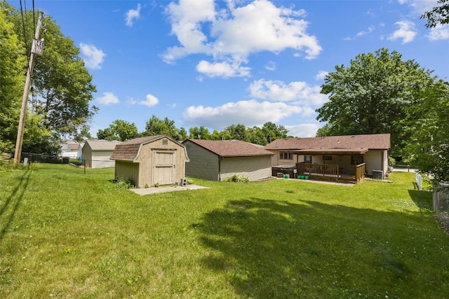2540 Lori Dr SW, Cedar Rapids, IA 52404 - view of yard featuring a shed and a deck