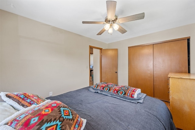 2469 1st St SW, Cedar Rapids, IA 52404 - bedroom with a closet and a ceiling fan