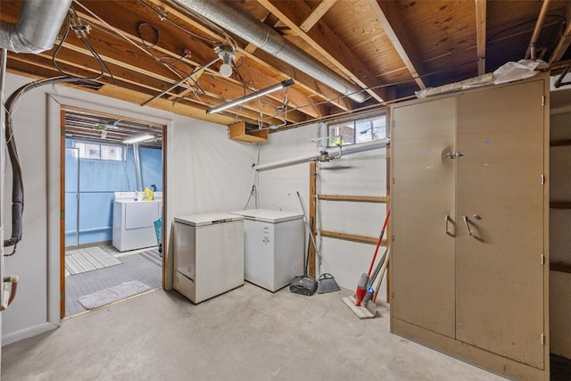 2469 1st St SW, Cedar Rapids, IA 52404 - basement featuring separate washer and dryer and refrigerator