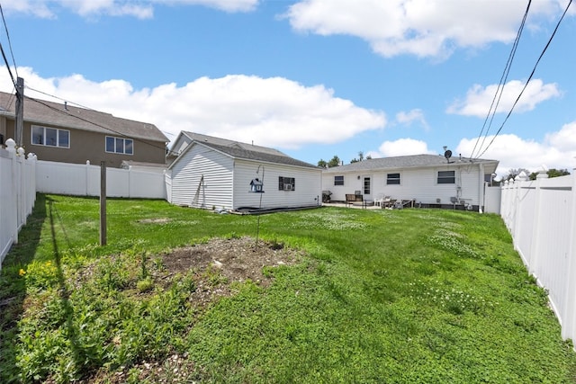 2469 1st St SW, Cedar Rapids, IA 52404 - rear view of house featuring a fenced backyard and a patio