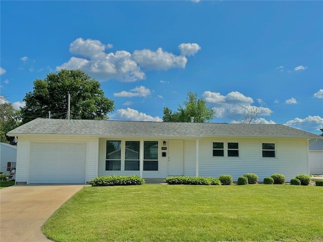3025 4th Ave, Marion, IA 52302 - single story home with a front yard, driveway, and an attached garage