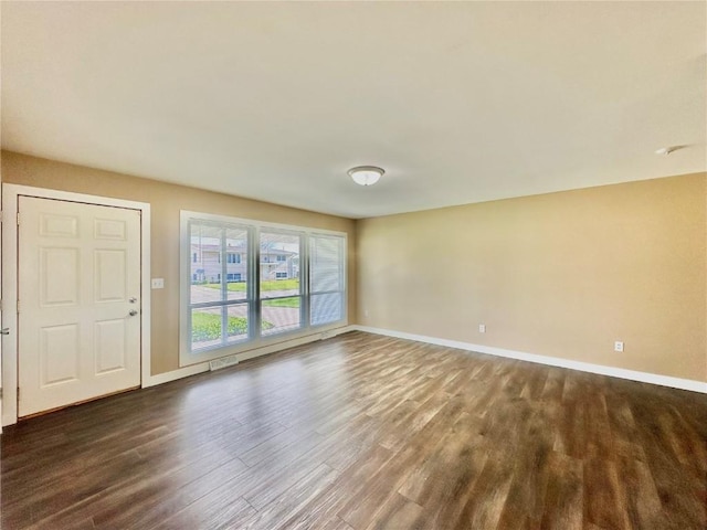 3025 4th Ave, Marion, IA 52302 - spare room featuring dark wood-style floors