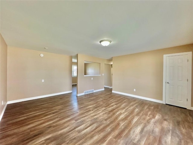 3025 4th Ave, Marion, IA 52302 - unfurnished room featuring wood finished floors and baseboards