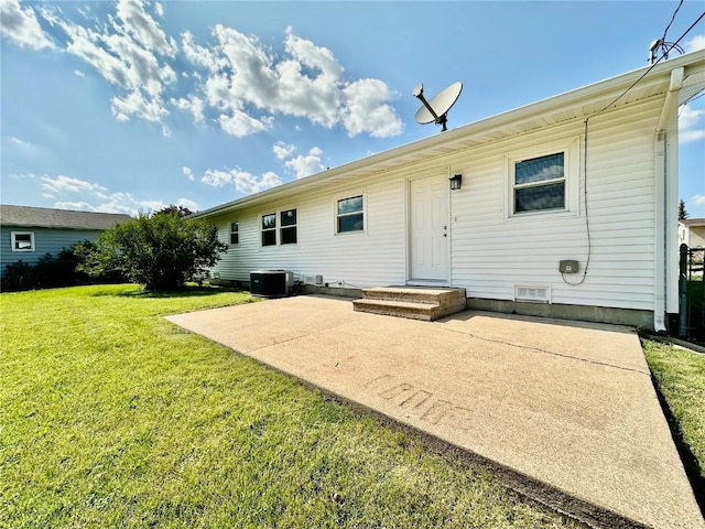 3025 4th Ave, Marion, IA 52302 - rear view of house with a patio and a lawn