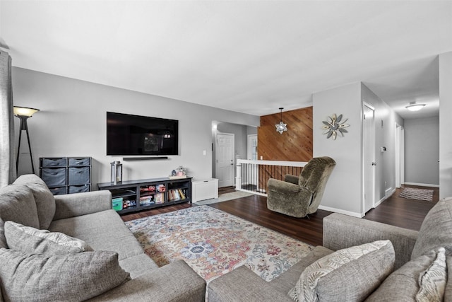 1428 Timber Ridge Trl NE, Solon, IA 52333 - living room featuring wood finished floors and baseboards