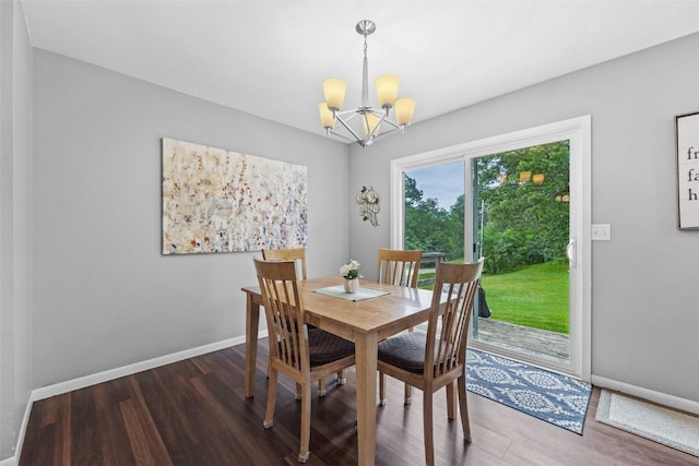 1428 Timber Ridge Trl NE, Solon, IA 52333 - dining space featuring dark wood-type flooring and a chandelier