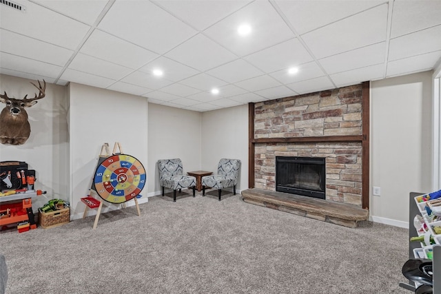1428 Timber Ridge Trl NE, Solon, IA 52333 - playroom with carpet, a fireplace, recessed lighting, and a paneled ceiling