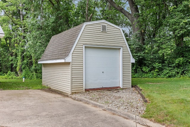 1428 Timber Ridge Trl NE, Solon, IA 52333 - detached garage featuring a storage shed and view of scattered trees