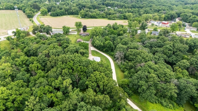 1428 Timber Ridge Trl NE, Solon, IA 52333 - aerial view of property and surrounding area featuring a heavily wooded area
