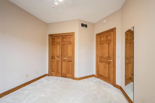 3519 Timber Ridge Trl NE, Cedar Rapids, IA 52411 - unfurnished bedroom with carpet flooring, a closet, and a ceiling fan