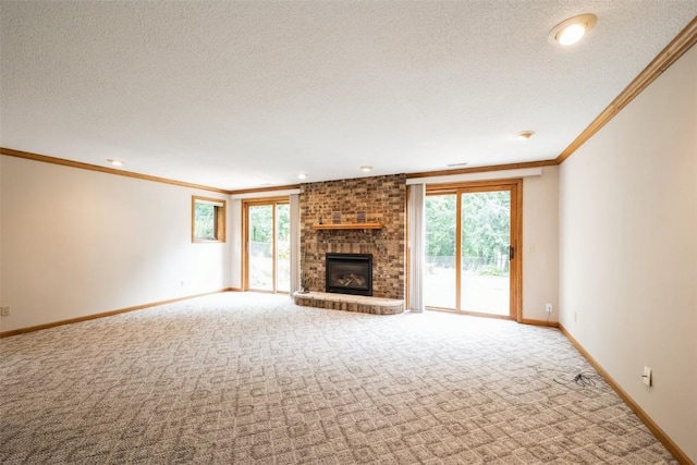 3519 Timber Ridge Trl NE, Cedar Rapids, IA 52411 - unfurnished living room featuring carpet, ornamental molding, plenty of natural light, a textured ceiling, and a brick fireplace