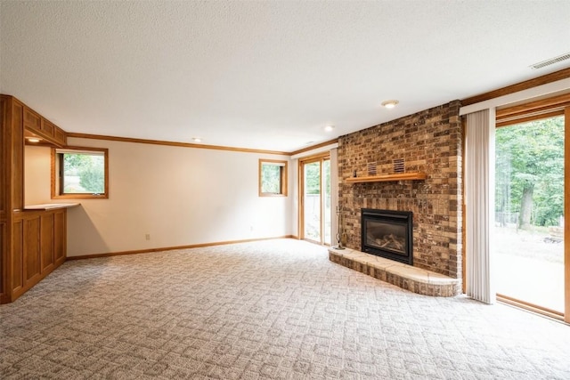 3519 Timber Ridge Trl NE, Cedar Rapids, IA 52411 - unfurnished living room featuring carpet, a fireplace, and ornamental molding