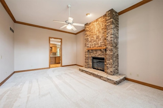 3519 Timber Ridge Trl NE, Cedar Rapids, IA 52411 - unfurnished living room featuring crown molding, a ceiling fan, light colored carpet, and a brick fireplace