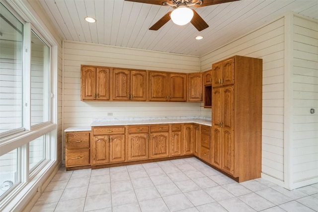 3519 Timber Ridge Trl NE, Cedar Rapids, IA 52411 - kitchen featuring light countertops, brown cabinetry, ceiling fan, wood ceiling, and recessed lighting
