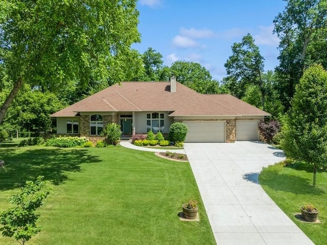 3519 Timber Ridge Trl NE, Cedar Rapids, IA 52411 - ranch-style home featuring a garage, driveway, a front yard, and a chimney