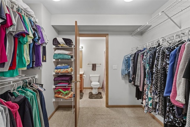 664 J Ave NE Unit A, Cedar Rapids, IA 52402 - spacious closet with carpet floors and tile patterned flooring