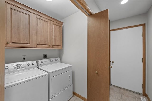 664 J Ave NE Unit A, Cedar Rapids, IA 52402 - washroom featuring cabinet space, washer and clothes dryer, recessed lighting, and light tile patterned flooring