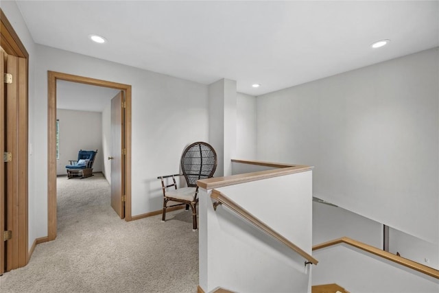 664 J Ave NE Unit A, Cedar Rapids, IA 52402 - hallway with an upstairs landing, light carpet, and recessed lighting