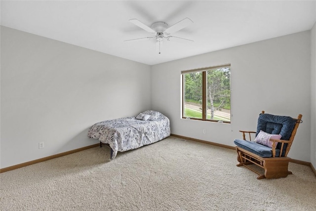 664 J Ave NE Unit A, Cedar Rapids, IA 52402 - bedroom with carpet flooring and a ceiling fan