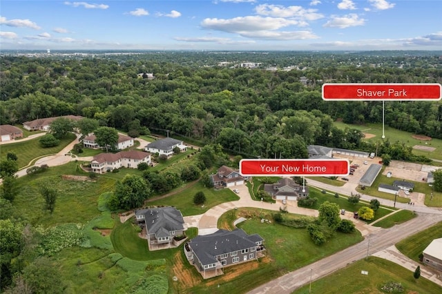 664 J Ave NE Unit A, Cedar Rapids, IA 52402 - aerial overview of property's location featuring a heavily wooded area
