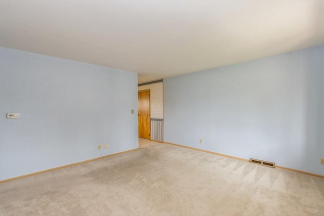 5660 Briarwood St SW, Cedar Rapids, IA 52401 - empty room with light carpet