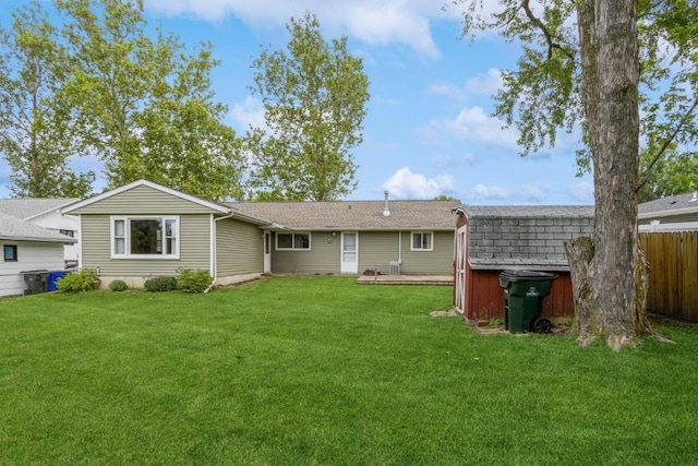 5660 Briarwood St SW, Cedar Rapids, IA 52401 - back of house with roof with shingles