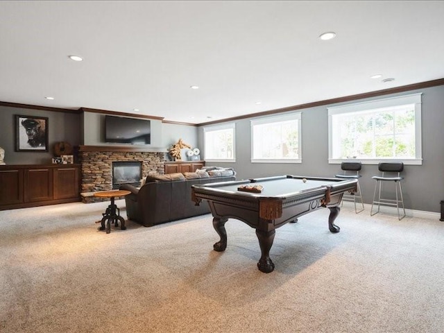 4390 Flagstick Dr, Marion, IA 52302 - playroom featuring ornamental molding, light colored carpet, billiards table, recessed lighting, and a stone fireplace
